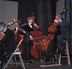 Galen and Bruce with double basses on stage